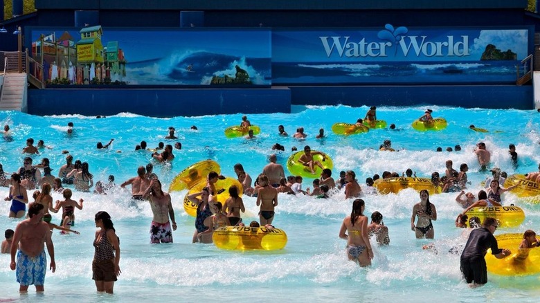 Family rafting on water slide